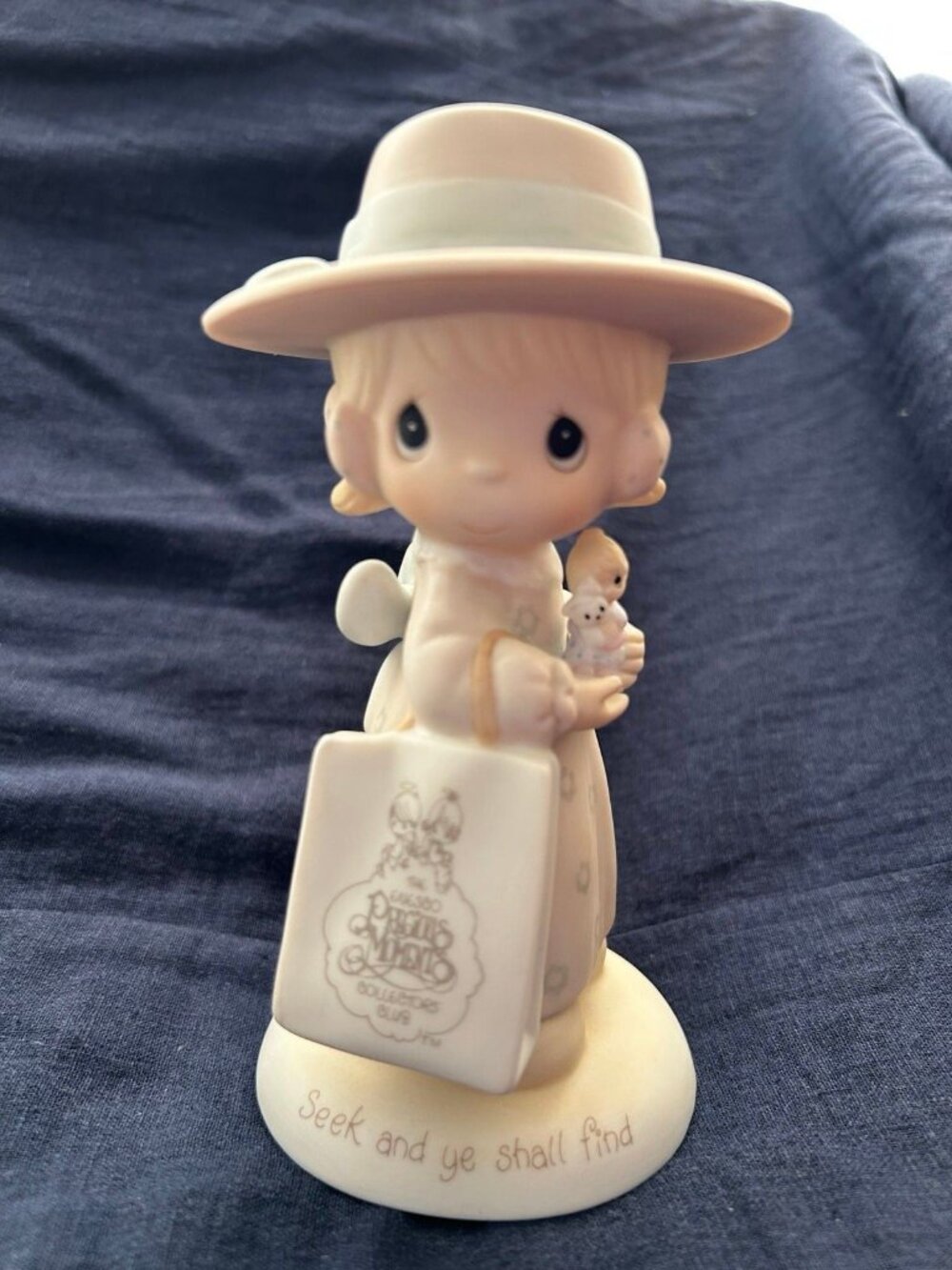 Vintage 1984 Shop Girl Precious Moments- “Seek and Ye Shall Find”